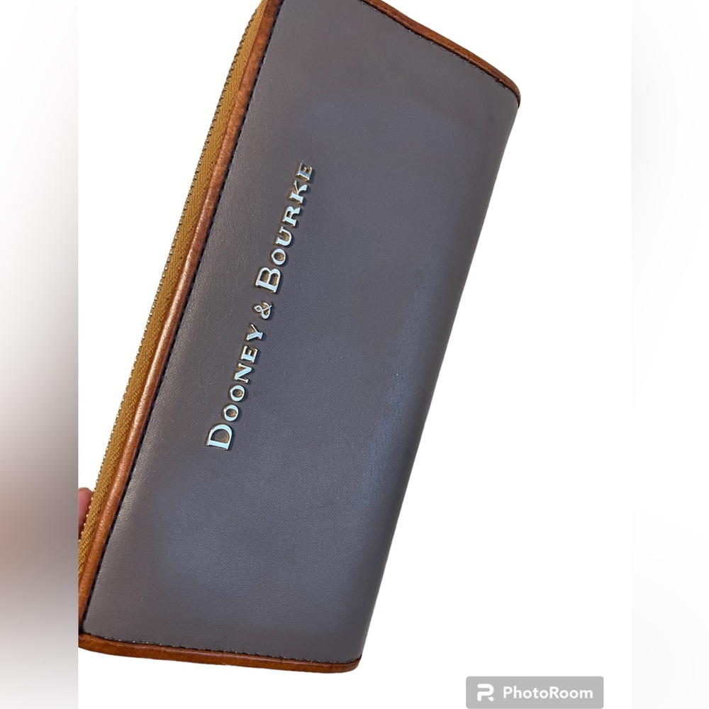 Dooney & Bourke Zip around wallet gray and brown leather with red interior
